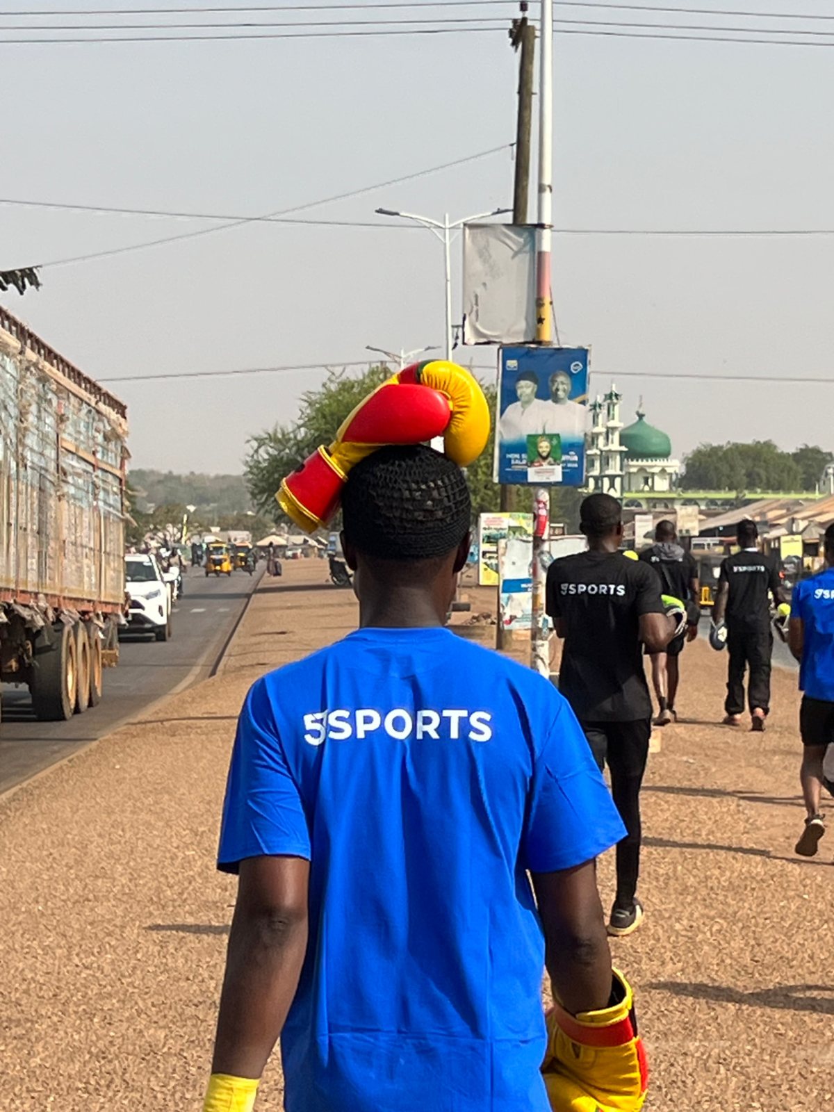 57Sports athlete walking to training in Tamale