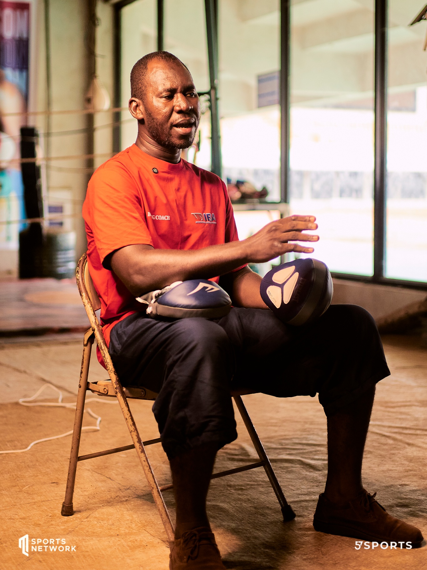 57Sports boxing coach in the gym
